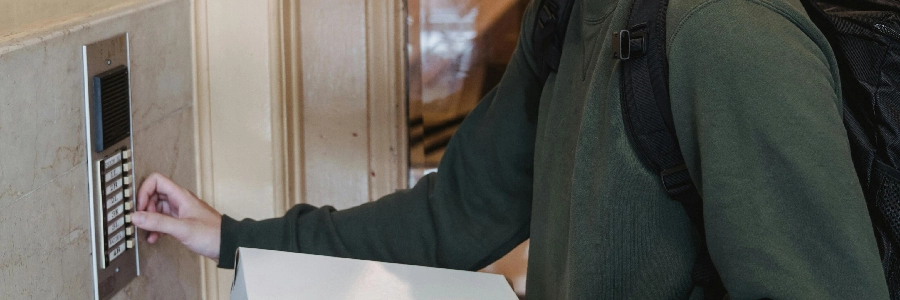 A guest inputting temporary codes into a smart lock