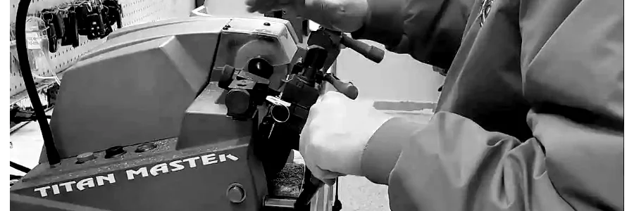 Okey Locksmith staff member making a key replacement