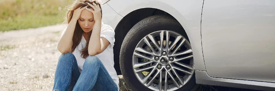 distressed woman locked out of her car