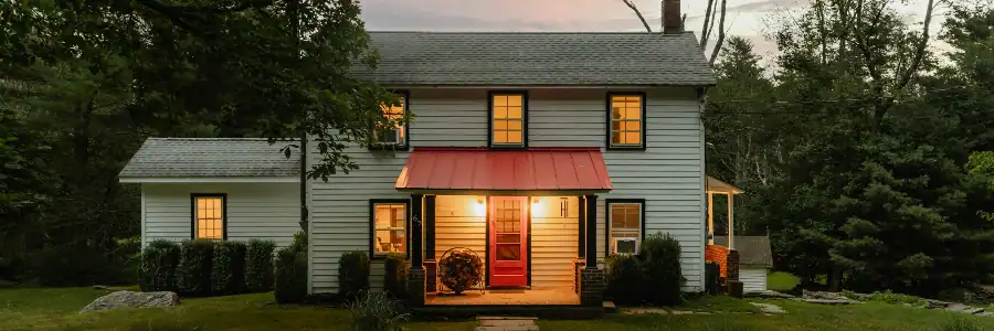 house exterior with all the lights open inside