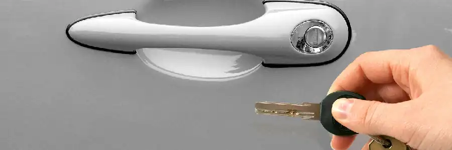 woman holding car keys