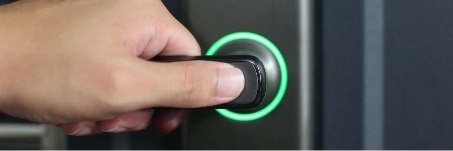 person using tag to enter door