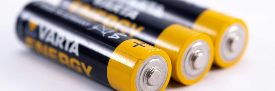 three batteries on table