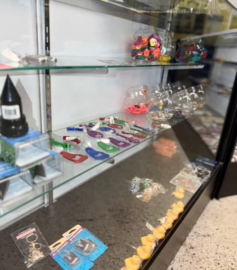 Key rings and locksmith accessories display at Okey Locksmith retail store
